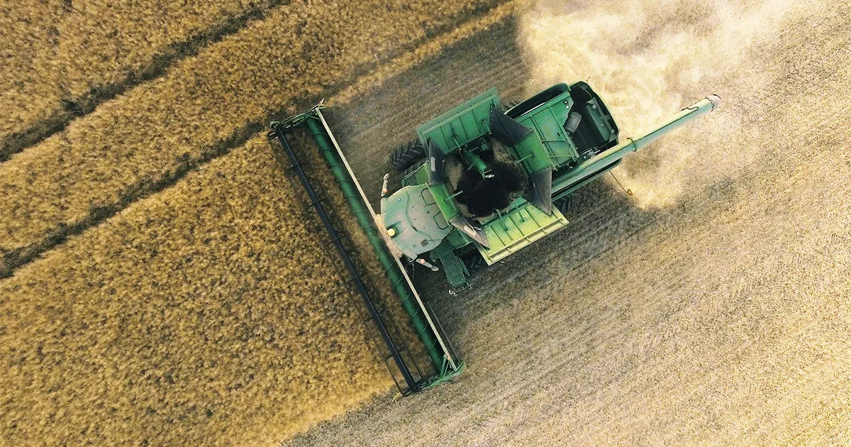 top down view of combine harvesting field