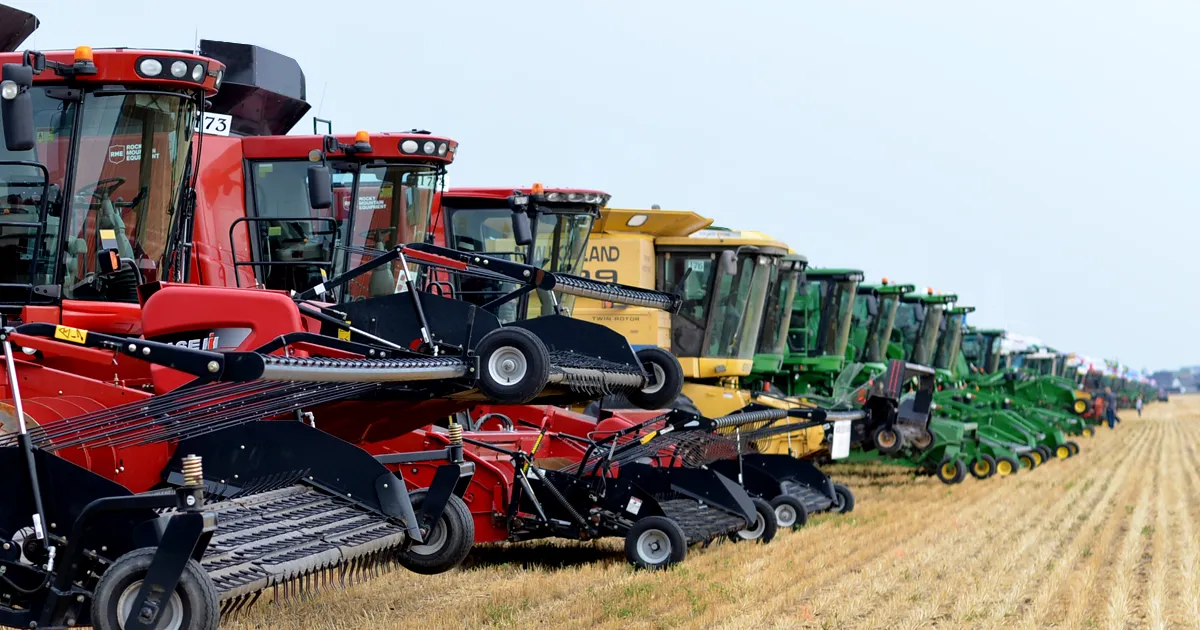 lineup of various brand of combines
