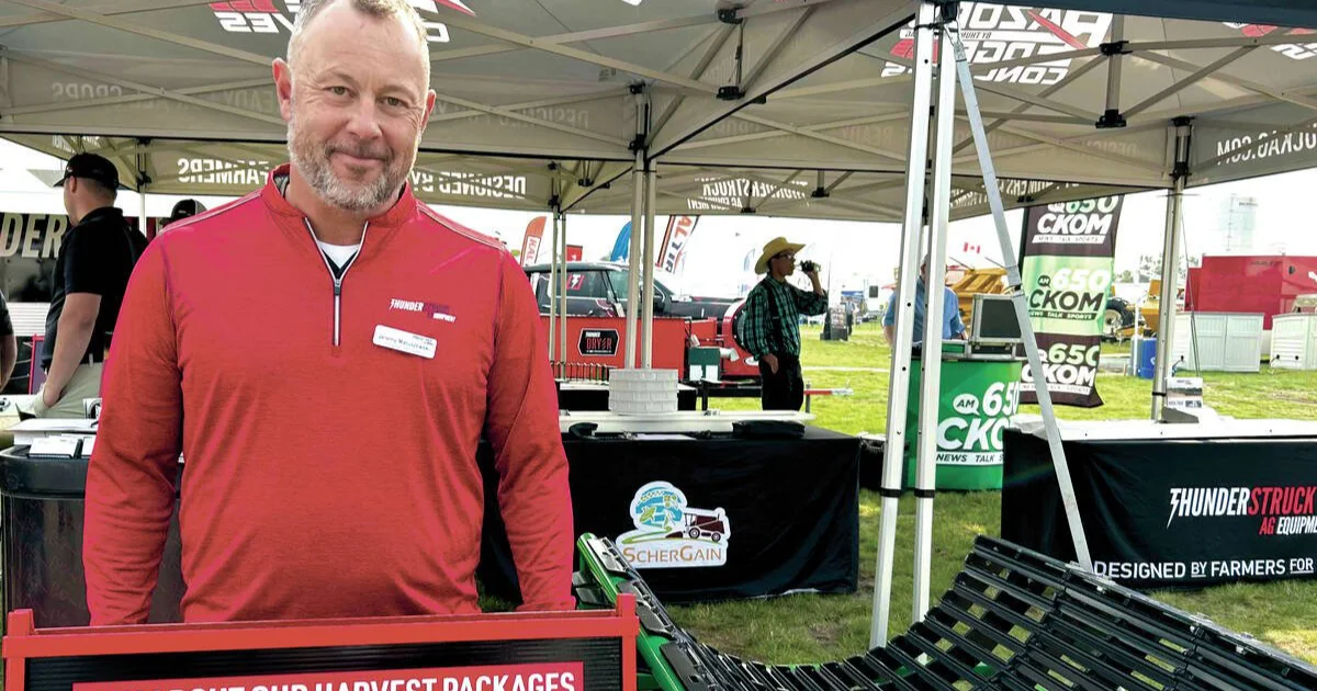 Jeremy Matuszewski at trade show standing beside Razors Edge Concaves