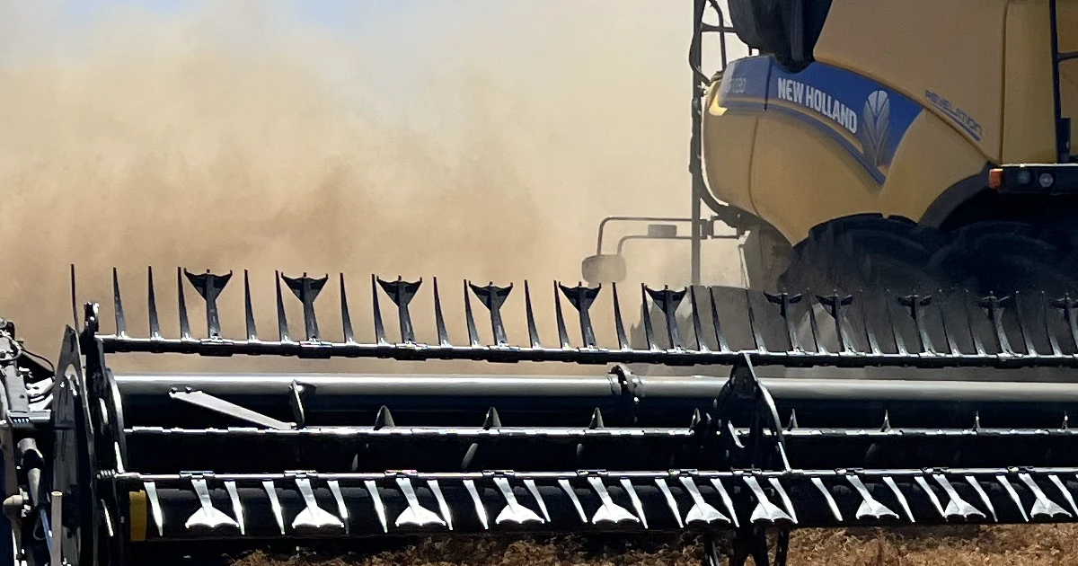 Duck Foot paddle tines installed on New Holland combine header