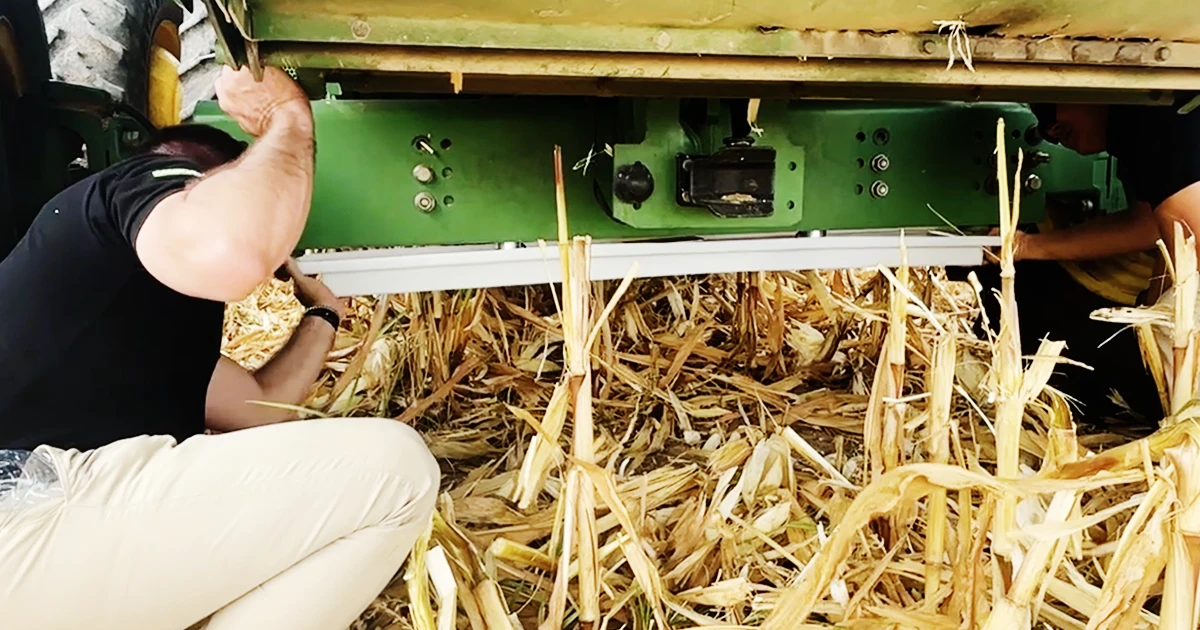 mounting Schergain drop pan on combine