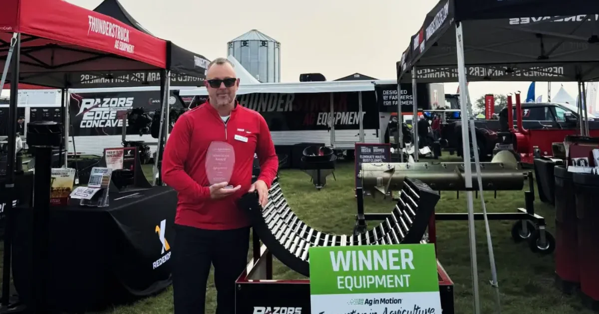 Jeremy Matuszewski next to award winning Razors Edge Concaves