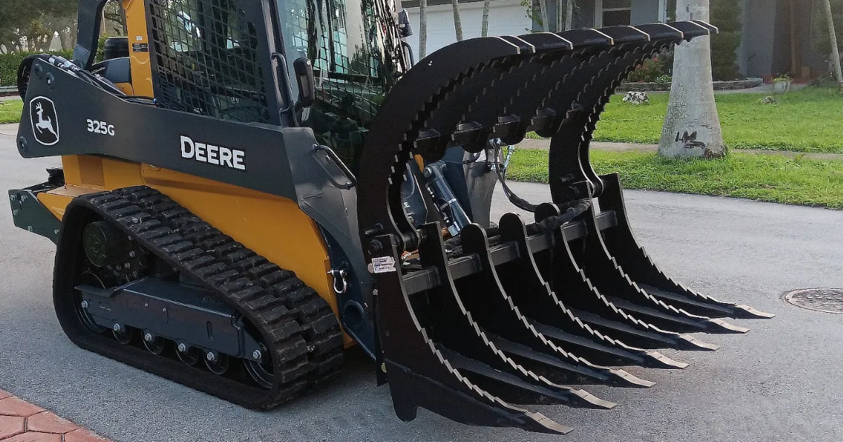 Skid-steer with Jenkins grapple