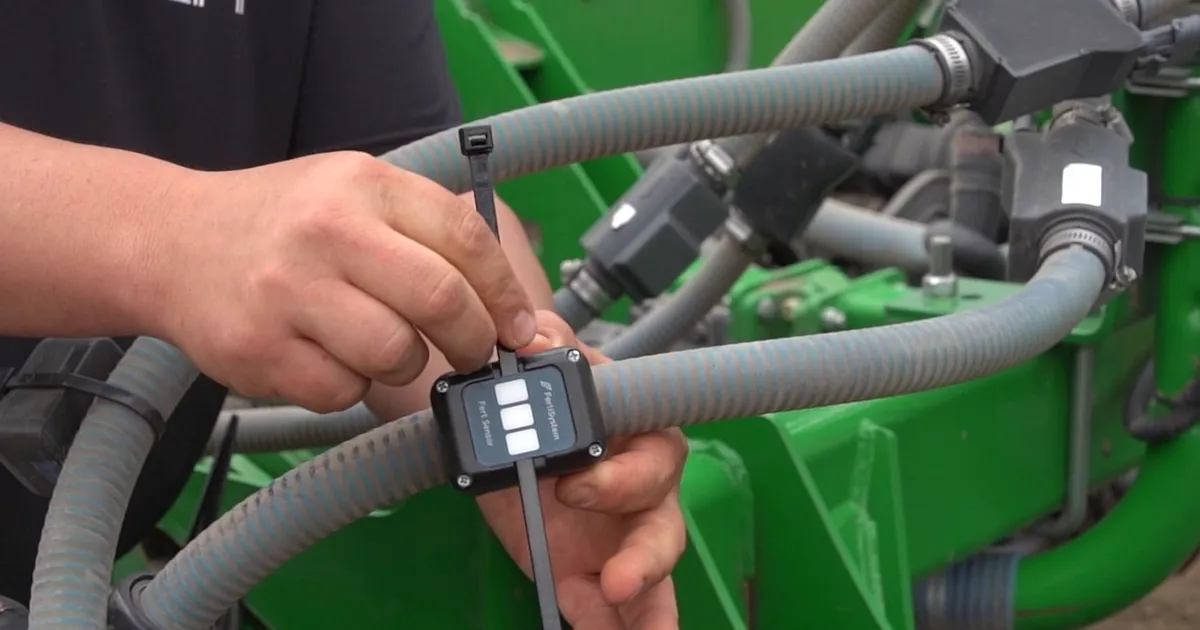 attaching fert sensor by Fertisystem to fertlizer tube