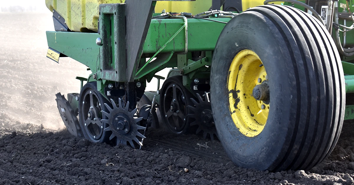 air seeder equipped with MudSmith spoked gauge wheels
